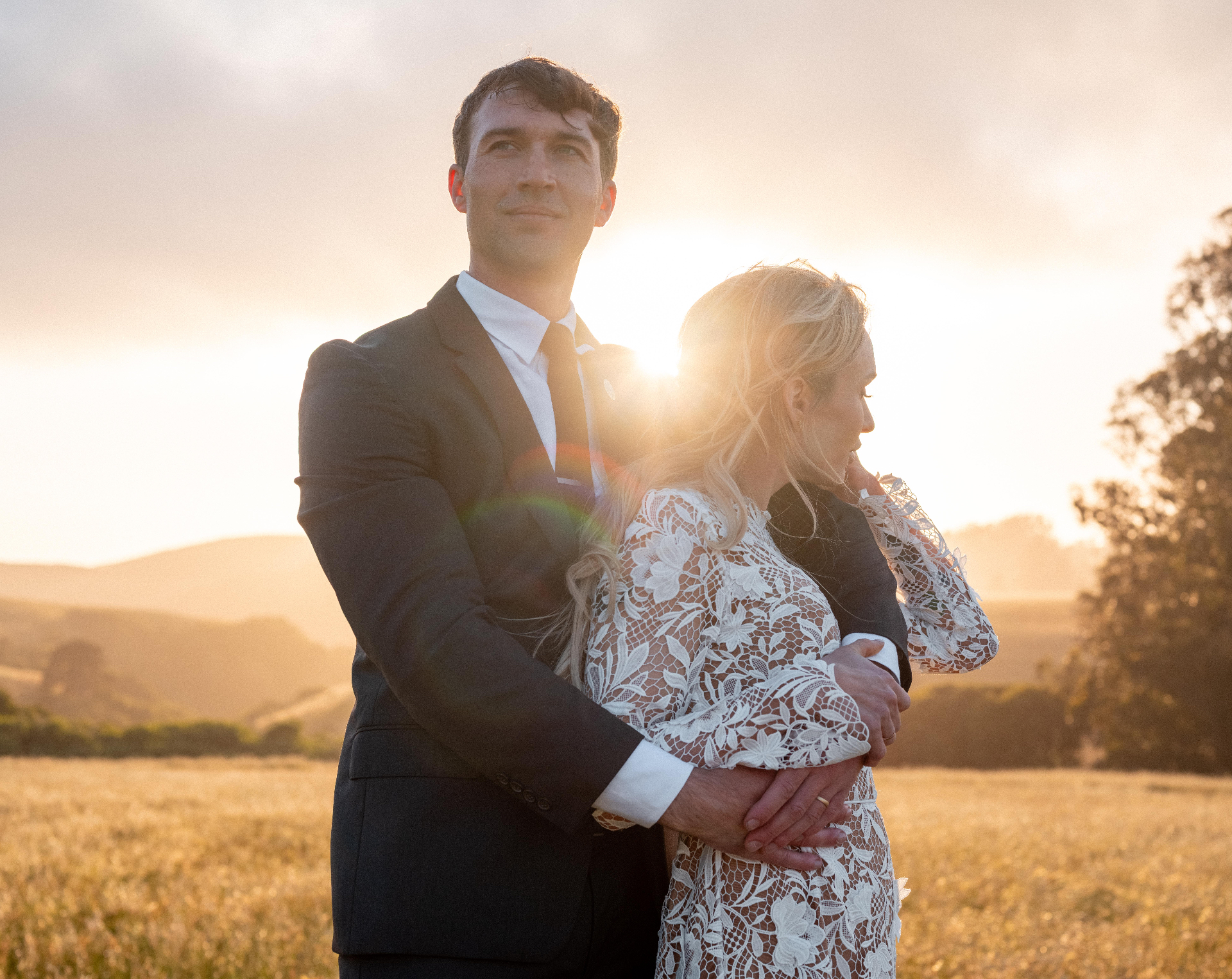 held, in the golden field — documentary wedding photograph by Norah Joy, Bay Area wedding photographer